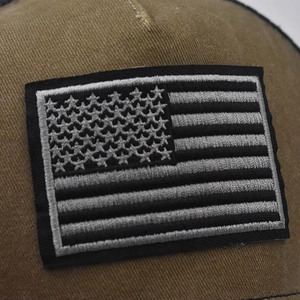 Tactical khaki baseball cap featuring precision American flag embroidery and washed twill fabric