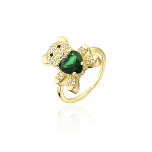 Detailed macro view of a gold bear ring with a green heart-shaped zircon and pave stones