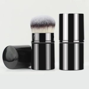 Retractable makeup brush with black metal tube and soft bristles for foundation and powder