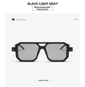 Front view of double-bridge square sunglasses featuring black frames and light gray lenses