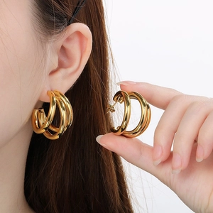Chic triple-layer gold hollow C-shaped hoop earrings made of polished stainless steel