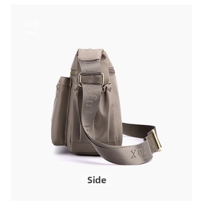 Side view of multi-layer khaki nylon crossbody bag with wide jacquard strap