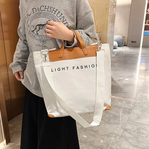 Retro canvas tote bag in white with brown leather trim and Light Fashion lettering