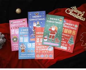 Macro top view of colorful Christmas gift bags arranged on red velvet background