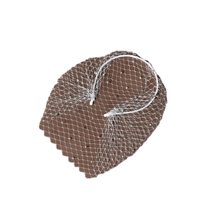Elegant bridal headband with white mesh veil and sparkling silver beads on white background