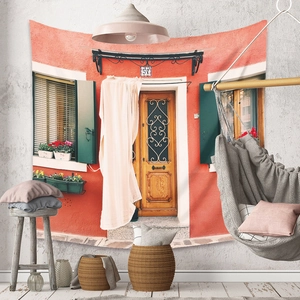 Detail of bohemian tapestry featuring a realistic European architecture and red facade