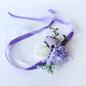 Elegant white rose and purple floral wrist corsage with ribbons for weddings and parties