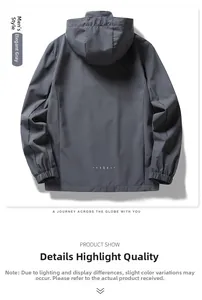 Rear view of grey outdoor hooded jacket showing elastic cuffs and reflective dots detail