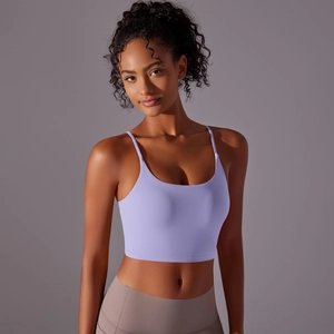 Detail of lavender yoga sports bra with thin straps and supportive wide hem band