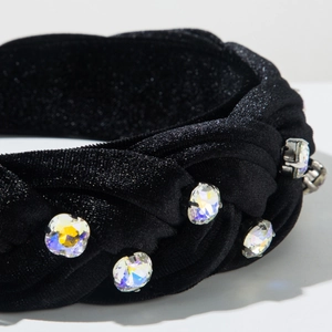 Detailed macro view of the braided velvet headband featuring AB crystal embellishments