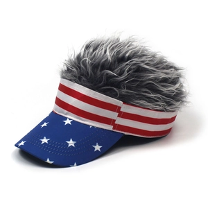 Detail of grey hair wig attachment on top of a US flag pattern sun visor baseball cap