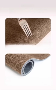 Detail of durable faux linen dish drying mat showing scratch resistance and roll-up storage