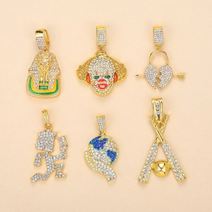 Hip hop style gold-plated necklaces with iced out pendants including pharaoh and joker motifs