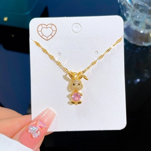 Pink rabbit pendant necklace in gold-plated steel with zirconia stones for women
