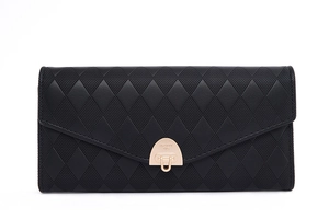 Detail of black long wallet featuring quilted rhombic texture and golden semi-circle clasp