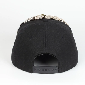 Detail of black snapback baseball cap with silver rhinestone studs and adjustable buckle