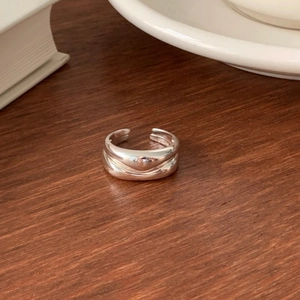 Minimalist 925 sterling silver chunky open ring on a warm vintage wooden background