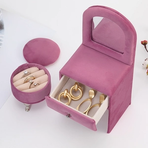 Purple velvet sofa-shaped jewelry organizer with mirror and mini round storage case