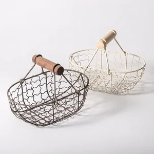 Minimalist metal wire snack baskets with wooden handles in vintage industrial style