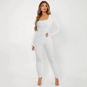 Women's white square neck long sleeve ribbed knit yoga jumpsuit in a slim fit