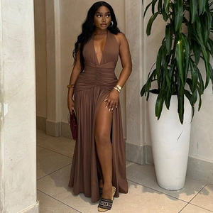 Detail of deep V-neck and pleated waist on a coffee sleeveless maxi dress with side slit