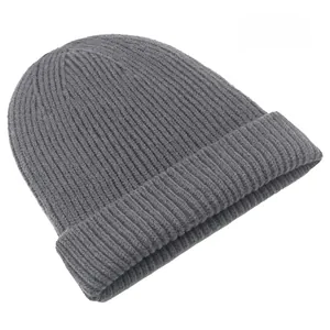 Detail of dark grey ribbed knit beanie showing high-quality stitching and texture