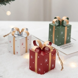 Nordic iron mini Christmas gift box ornaments in red, green, and white with gold bows