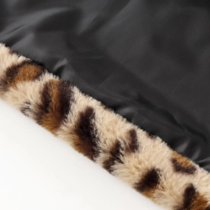 Women's faux fur coat with leopard print collar and smooth black lining texture