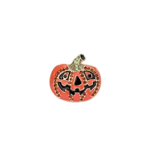 Detail of Halloween pumpkin brooch with orange enamel and sparkling rhinestones
