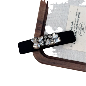 French retro rectangular hair clip with black fabric and shimmering grey rhinestones