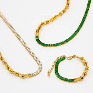 Detailed set of gold U-link necklaces and bracelet with baguette zircon stones