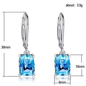 Blue faux topaz drop earrings with silver leverback and rectangular zircon stones