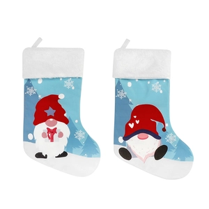 Chaussettes de Noël en peluche bleues et blanches avec motifs gnomes et flocons de neige