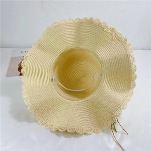 Women straw sun hat with wavy brim and elastic wind strap for summer beach beach