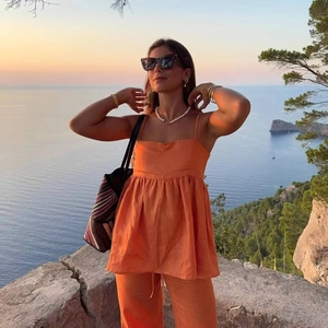 Ensemble haut sans manches et pantalon large orange style lin pour vacances au soleil