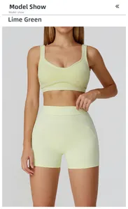 Detail of high-waisted lemon green yoga set with white trim on sports bra and shorts