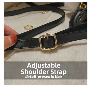 Detail of adjustable black leather strap with premium gold metal buckle and fine stitching