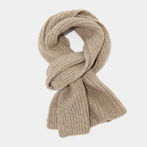 Detail of oatmeal knit scarf featuring vertical ribbed texture and soft drape quality