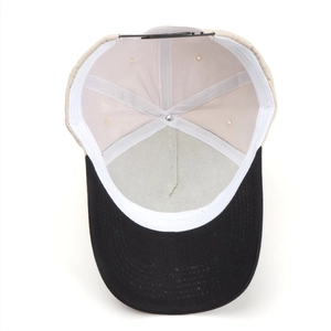 Detail view of the baseball cap interior showing plastic strap and stitching