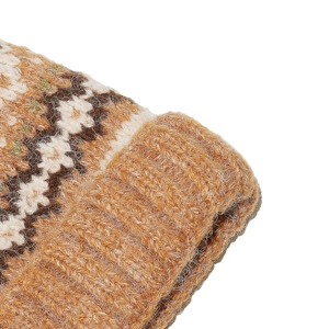 Close-up of Fair Isle knit hat showing thick wool texture and geometric diamond pattern