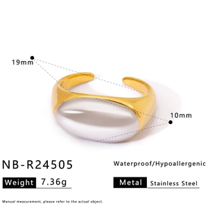 Detailed macro view of gold-plated stainless steel ring with silver oval mirror inlay