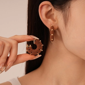 Maillard style brown faux leather U-shaped striped stud earrings with gold metal beads