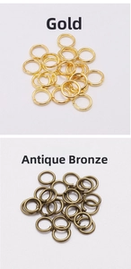 Detail of gold and antique bronze open jump rings for DIY jewelry making and necklaces