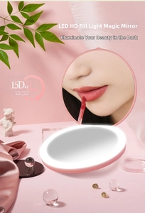 Pink portable LED makeup mirror with circular ring light and 15-day battery life