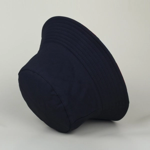 Close-up of the stitching details and durable fabric of this navy blue bucket hat