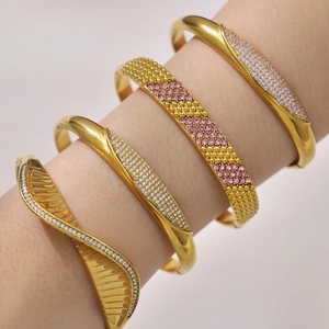Luxurious 18k gold plated bracelet set with sparkling crystals on female wrist