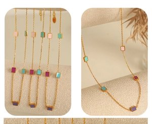 Detailed view of 18K gold plated titanium necklace with colorful enamel square pendants