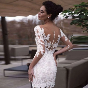 White lace short wedding dress with long sleeves and button back detail for bridal wear