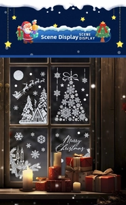 Cozy scene display of white Christmas window decals with Santa and snowflakes