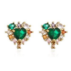 Macro shot of 18K gold plated heart stud earrings with multi-colored gemstones